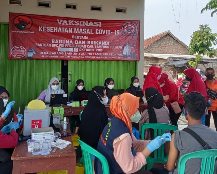 Vaksinasi BAGUNA DPC PDI Perjuangan Kabupaten Lampung Selatan  Di Desa Karang Sari Kecamatan Jatia Aung Kabupaten Lampung Selatan